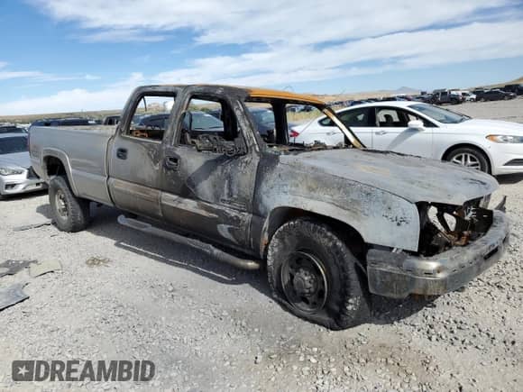 2004 Chevrolet Silverado 2500HD LS z VIN 1GCHK231X4F137978, wystawiony jako Copart lot #66332815 z przebiegiem Nie podano mil oraz Nie do naprawy • Non repairable. Historia ofert i sprzedaży dostępna na DreamBid. Obrazek 4.