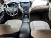 2015 Hyundai Santa Fe z VIN 5XYZTDLB7FG233928, wystawiony jako Copart lot #82685615 z przebiegiem 131 358 mil mil oraz Czysty tytuł • Clean title. Historia ofert i sprzedaży dostępna na DreamBid. Obrazek 8.