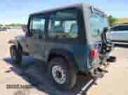 1995 Jeep Wrangler S with VIN 1J4FY19P4SP263783, listed as a Copart auction lot 69754055 with 176,518 mi miles and Salvage title. Bid and sale history available at DreamBid. Image 2.