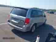 2014 Dodge Grand Caravan SXT with VIN 2C4RDGCG1ER347556, listed as a IAAI auction lot 43221709 with 245,875 mi miles and . Bid and sale history available at DreamBid. Image 4.