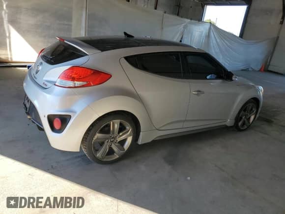 2014 Hyundai Veloster Turbo R-Spec с VIN KMHTC6AE9EU196937, выставлен на аукционе Copart как лот 70386975 с пробегом 150 522 миль миль и Чистый • Clean title. История ставок и продаж доступна на DreamBid. Изображение 3.