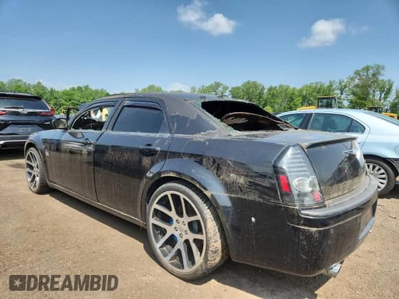 2006 Chrysler 300 C SRT-8 с VIN 2C3KA73W46H372240, выставлен на аукционе Copart как лот 61534145 с пробегом Не указан миль и Списание • Salvage title. История ставок и продаж доступна на DreamBid. Изображение 2.