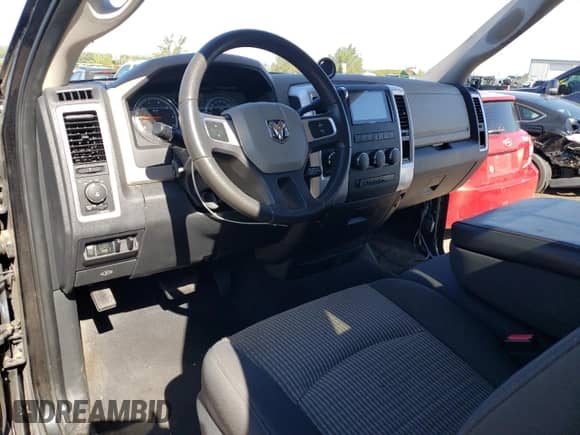 2010 Dodge 1500 Sport z VIN 3D7JV1ET4AG165373, wystawiony jako Copart lot #68044944 z przebiegiem 105 516 mil mil oraz Szkoda całkowita • Salvage title. Historia ofert i sprzedaży dostępna na DreamBid. Obrazek 8.