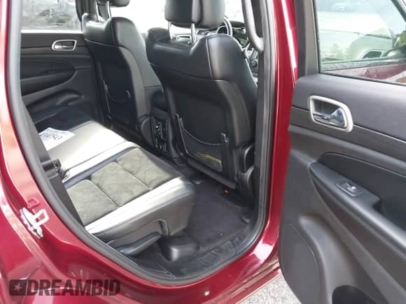 2018 Jeep Grand Cherokee Laredo E with VIN 1C4RJEAG3JC380531, listed as a IAAI auction lot 43147543 with 96,871 mi miles and . Bid and sale history available at DreamBid. Image 8.