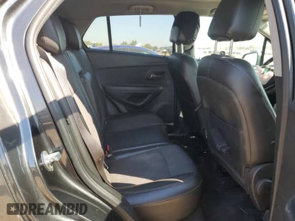 2018 Chevrolet Trax LT z VIN KL7CJLSB9JB616017, wystawiony jako Copart lot #80733635 z przebiegiem Nie podano mil oraz Szkoda całkowita • Salvage title. Historia ofert i sprzedaży dostępna na DreamBid. Obrazek 10.