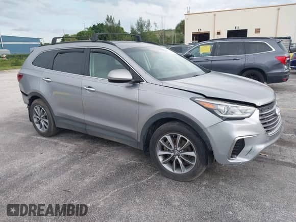 2017 Hyundai Santa Fe SE z VIN KM8SM4HF1HU243832, wystawiony jako IAAI lot #43320326 z przebiegiem 86 588 mil mil oraz . Historia ofert i sprzedaży dostępna na DreamBid. Obrazek 1.