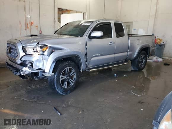 2018 Toyota Tacoma SR5 with VIN 5TFRZ5CN5JX066473, listed as a Copart auction lot 50875405 with 55,391 mi miles and Salvage title. Bid and sale history available at DreamBid. Image 1.