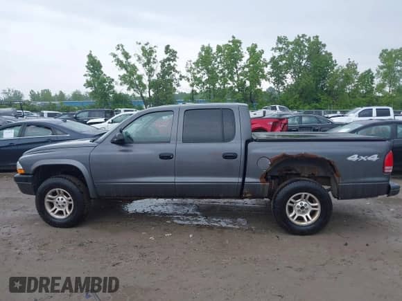 2003 Dodge Dakota Sport with VIN 1D7HG38N93S136111, listed as a IAAI auction lot 42439330 with 182,673 mi miles and . Bid and sale history available at DreamBid. Image 14.