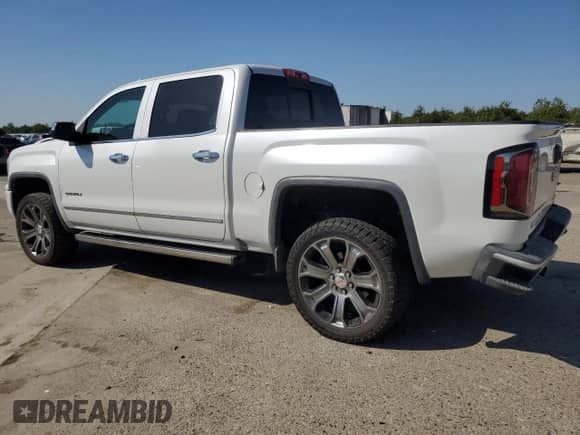 2016 GMC Sierra 1500 Denali z VIN 3GTU2PEJ2GG371785, wystawiony jako Copart lot #81668355 z przebiegiem 82 938 mil mil oraz Szkoda całkowita • Salvage title. Historia ofert i sprzedaży dostępna na DreamBid. Obrazek 2.