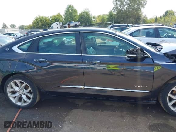 2014 Chevrolet Impala LTZ with VIN 2G1155S39E9114983, listed as a IAAI auction lot 43201789 with 125,595 mi miles and . Bid and sale history available at DreamBid. Image 13.