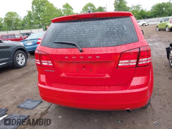 2013 Dodge Journey American Value with VIN 3C4PDCAB5DT733013, listed as a IAAI auction lot 42354707 with 128,391 mi miles and . Bid and sale history available at DreamBid. Image 16.