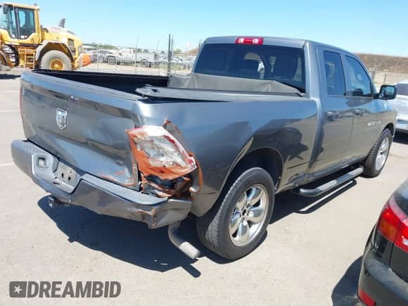 2011 Ram 1500 ST with VIN 1D7RB1GK7BS550307, listed as a IAAI auction lot 42926320 with 180,015 mi miles and . Bid and sale history available at DreamBid. Image 4.
