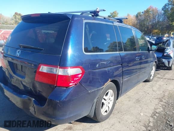 2007 Honda Odyssey EX with VIN 5FNRL38427B127934, listed as a IAAI auction lot 43472923 with 263,495 mi miles and . Bid and sale history available at DreamBid. Image 4.