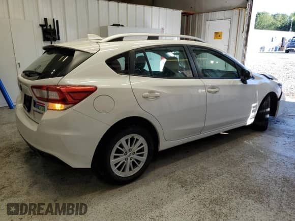 2018 Subaru Impreza Premium with VIN 4S3GTAD69J3731259, listed as a Copart auction lot 80386055 with 72,982 mi miles and Salvage title. Bid and sale history available at DreamBid. Image 3.