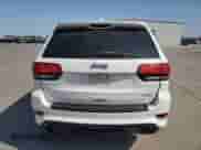 2016 Jeep Grand Cherokee SRT с VIN 1C4RJFDJ0GC427892, выставлен на аукционе Copart как лот 51633235 с пробегом 64 354 миль миль и Списание • Salvage title. История ставок и продаж доступна на DreamBid. Изображение 6.