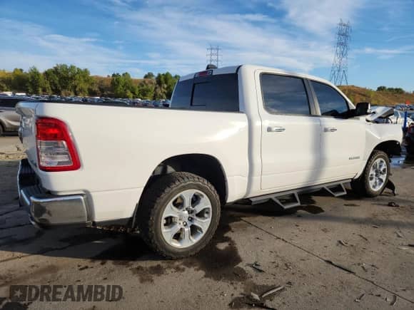 2020 Ram 1500 Lone Star with VIN 1C6SRFFT1LN379401, listed as a Copart auction lot 81635965 with 77,752 mi miles and Salvage title. Bid and sale history available at DreamBid. Image 3.