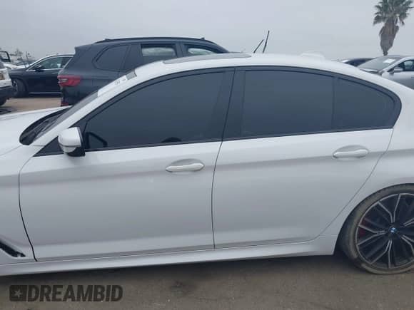 2023 BMW 5 Series 540i with VIN WBA53BJ00PWY19621, listed as a IAAI auction lot 42433550 with 50,181 mi miles and . Bid and sale history available at DreamBid. Image 14.