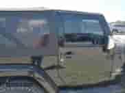 2007 Jeep Wrangler Sahara z VIN 1J4FA54157L212192, wystawiony jako Copart lot #63062135 z przebiegiem 146 048 mil mil oraz Szkoda całkowita • Salvage title. Historia ofert i sprzedaży dostępna na DreamBid. Obrazek 11.