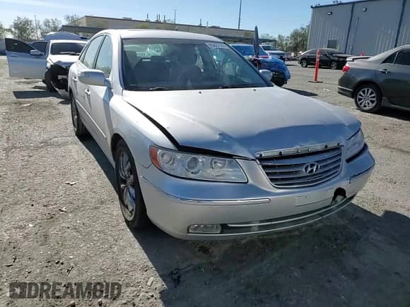 2007 Hyundai Azera SE с VIN KMHFC46F47A234162, выставлен на аукционе Copart как лот 85822104 с пробегом 122 281 миль миль и Списание • Salvage title. История ставок и продаж доступна на DreamBid. Изображение 11.