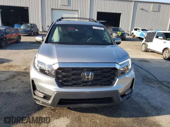 2023 Honda Passport EX-L with VIN 5FNYF8H55PB008414, listed as a Copart auction lot 67765585 with 18,682 mi miles and Non repairable. Bid and sale history available at DreamBid. Image 5.
