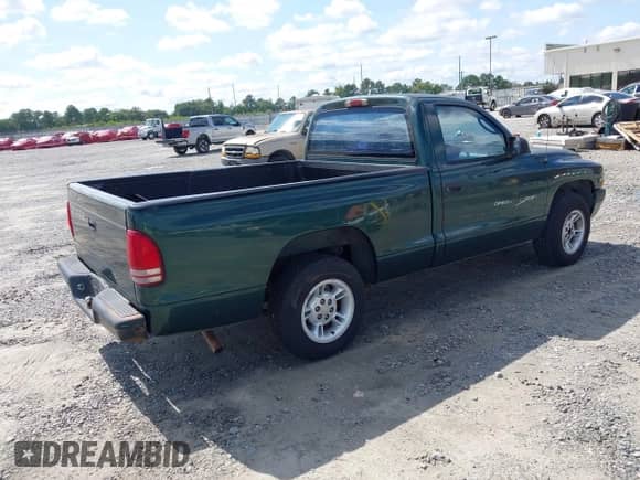 2000 Dodge Dakota with VIN 1B7FL26N0YS551920, listed as a IAAI auction lot 42937737 with 250,459 mi miles and . Bid and sale history available at DreamBid. Image 4.