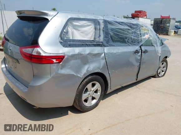 2015 Toyota Sienna L with VIN 5TDZK3DCXFS627611, listed as a IAAI auction lot 42823348 with 298,381 mi miles and . Bid and sale history available at DreamBid. Image 2.