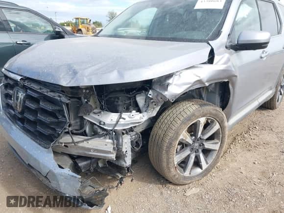 2024 Honda Pilot Elite with VIN 5FNYG1H82RB033854, listed as a IAAI auction lot 43380683 with 37,507 mi miles and . Bid and sale history available at DreamBid. Image 6.