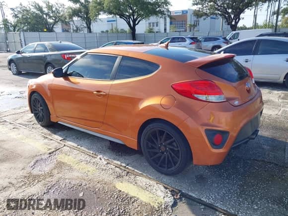 2016 Hyundai Veloster Turbo with VIN KMHTC6AE0GU273097, listed as a IAAI auction lot 43161179 with 149,883 mi miles and . Bid and sale history available at DreamBid. Image 3.