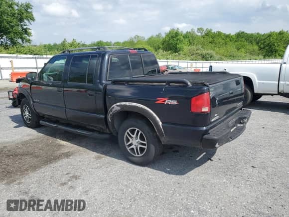 2004 Chevrolet S-10 LS z VIN 1GCDT13X74K134585, wystawiony jako Copart lot #57352545 z przebiegiem 174 241 mil mil oraz Szkoda całkowita • Salvage title. Historia ofert i sprzedaży dostępna na DreamBid. Obrazek 2.