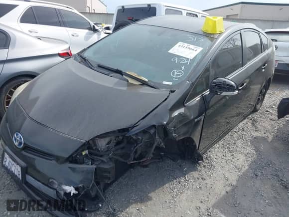 2015 Toyota Prius Four z VIN JTDKN3DU4F2004672, wystawiony jako IAAI lot #43159664 z przebiegiem 141 558 mil mil oraz . Historia ofert i sprzedaży dostępna na DreamBid. Obrazek 2.