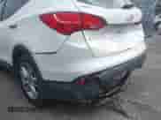 2014 Hyundai Santa Fe z VIN 5XYZU3LA6EG223937, wystawiony jako IAAI lot #43298591 z przebiegiem 109 586 mil mil oraz . Historia ofert i sprzedaży dostępna na DreamBid. Obrazek 6.