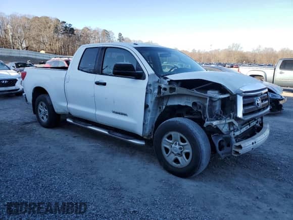 2012 Toyota Tundra z VIN 5TFRU5F1XCX027582, wystawiony jako Copart lot #85649634 z przebiegiem 267 030 mil mil oraz Szkoda całkowita • Salvage title. Historia ofert i sprzedaży dostępna na DreamBid. Obrazek 4.