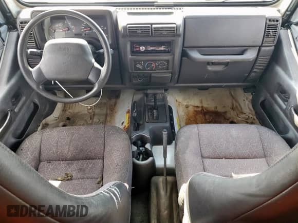 2001 Jeep Wrangler Sport с VIN 1J4FA49S01P305620, выставлен на аукционе Copart как лот 85516025 с пробегом Не указан миль и Списание • Salvage title. История ставок и продаж доступна на DreamBid. Изображение 8.