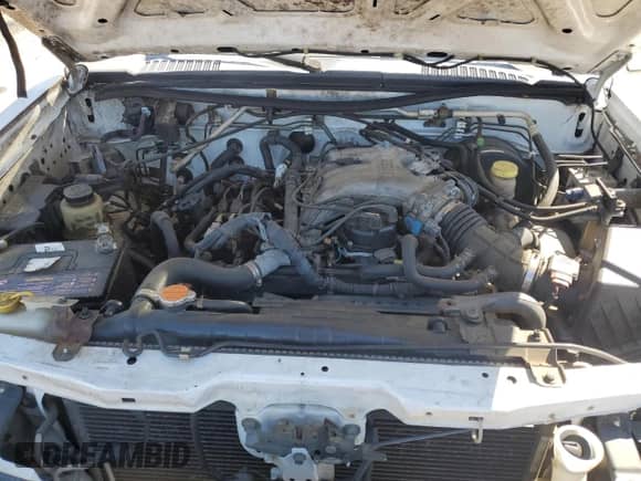 2001 Nissan Frontier SE Desert Runner z VIN 1N6ED26T81C397493, wystawiony jako Copart lot #48936295 z przebiegiem Nie podano mil oraz Szkoda całkowita • Salvage title. Historia ofert i sprzedaży dostępna na DreamBid. Obrazek 11.