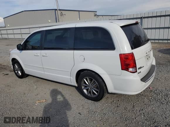 2016 Dodge Grand Caravan SE with VIN 2C4RDGBG4GR176841, listed as a Copart auction lot 82336855 with 148,270 mi miles and Clean title. Bid and sale history available at DreamBid. Image 2.