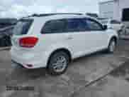 2015 Dodge Journey SXT with VIN 3C4PDDBGXFT606731, listed as a IAAI auction lot 43376713 with 124,087 mi miles and . Bid and sale history available at DreamBid. Image 4.