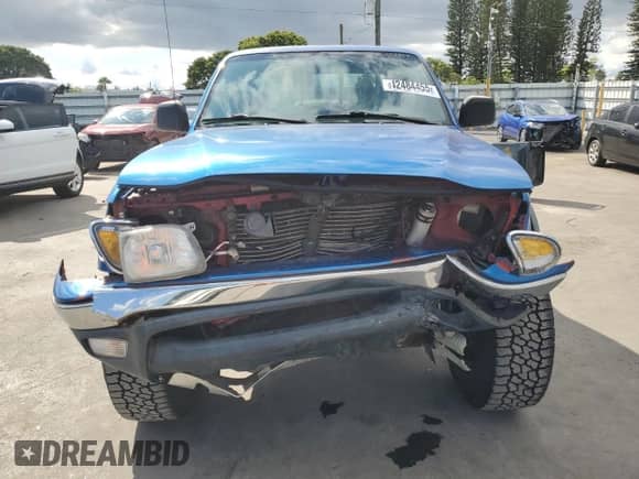2004 Toyota Tacoma PreRunner with VIN 5TESN92N54Z340774, listed as a Copart auction lot 82484455 with 147,005 mi miles and Salvage title. Bid and sale history available at DreamBid. Image 5.
