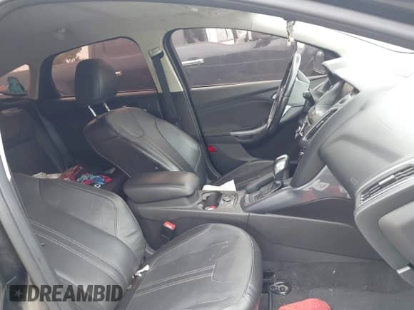 2014 Ford Focus Titanium with VIN 1FADP3N28EL205151, listed as a IAAI auction lot 43409829 with 126,461 mi miles and . Bid and sale history available at DreamBid. Image 5.