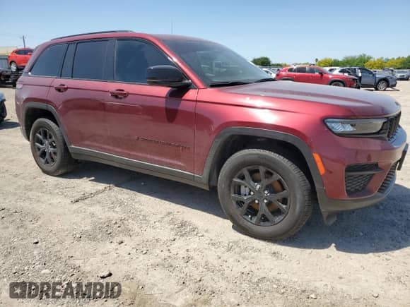 2024 Jeep Grand Cherokee Laredo with VIN 1C4RJHAG7RC110540, listed as a Copart auction lot 51540525 with 11,993 mi miles and Salvage title. Bid and sale history available at DreamBid. Image 4.
