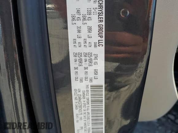 2011 Dodge Grand Caravan Express with VIN 2D4RN4DG7BR743175, listed as a Copart auction lot 70841465 with 122,098 mi miles and Salvage title. Bid and sale history available at DreamBid. Image 13.