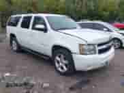 2010 Chevrolet Suburban LT with VIN 1GNUKJE32AR113764, listed as a IAAI auction lot 43277102 with 297,432 mi miles and . Bid and sale history available at DreamBid. Image 1.