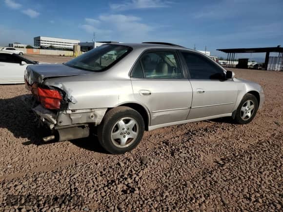 1999 Honda Accord EX with VIN 1HGCG1655XA067314, listed as a Copart auction lot 56604275 with 164,137 mi miles and Salvage title. Bid and sale history available at DreamBid. Image 3.