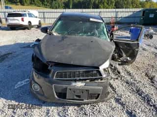 2014 Chevrolet Sonic LTZ с VIN 1G1JE5SB1E4177635, выставлен на аукционе Copart как лот 84280825 с пробегом Не указан миль и Списание • Salvage title. История ставок и продаж доступна на DreamBid. Изображение 5.