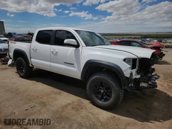 2018 Toyota Tacoma SR z VIN 3TMCZ5AN3JM164612, wystawiony jako Copart lot #70181335 z przebiegiem 134 510 mil mil oraz Szkoda całkowita • Salvage title. Historia ofert i sprzedaży dostępna na DreamBid. Obrazek 4.