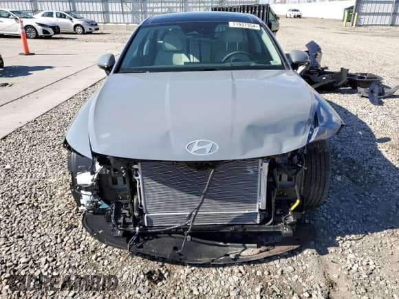 2024 Hyundai Sonata Limited с VIN KMHL54JJ1RA101239, выставлен на аукционе Copart как лот 71937354 с пробегом 1 372 миль миль и Списание • Salvage title. История ставок и продаж доступна на DreamBid. Изображение 5.