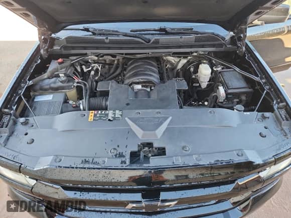 2018 Chevrolet Silverado 1500 LT z VIN 3GCUKREC9JG247985, wystawiony jako Copart lot #89700785 z przebiegiem 176 054 mil mil oraz Czysty tytuł • Clean title. Historia ofert i sprzedaży dostępna na DreamBid. Obrazek 11.