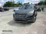 2018 Hyundai Santa Fe 2.4L z VIN 5NMZTDLB8JH093127, wystawiony jako Copart lot #81774275 z przebiegiem 104 339 mil mil oraz Szkoda całkowita • Salvage title. Historia ofert i sprzedaży dostępna na DreamBid. Obrazek 14.