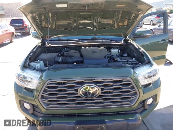 2021 Toyota Tacoma SR5 z VIN 3TMDZ5BN8MM114649, wystawiony jako IAAI lot #43493615 z przebiegiem 63 288 mil mil oraz . Historia ofert i sprzedaży dostępna na DreamBid. Obrazek 10.