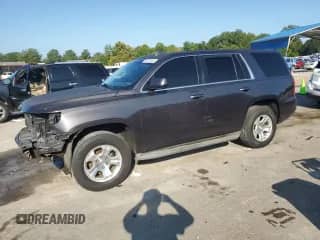 2015 Chevrolet Tahoe Commercial с VIN 1GNLC2EC3FR574770, выставлен на аукционе Copart как лот 68491535 с пробегом 80 826 миль миль и Списание • Salvage title. История ставок и продаж доступна на DreamBid. Изображение 1.