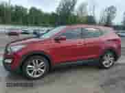 2016 Hyundai Santa Fe z VIN 5XYZWDLA2GG307823, wystawiony jako Copart lot #68878125 z przebiegiem 127 135 mil mil oraz Czysty tytuł • Clean title. Historia ofert i sprzedaży dostępna na DreamBid. Obrazek 1.